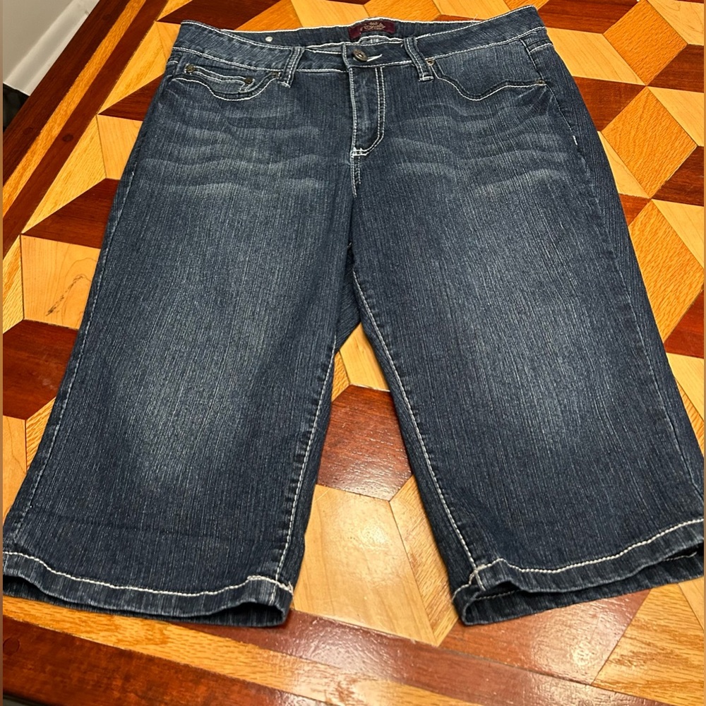 Royalty denim shorts size 10 with white embroidery on pockets